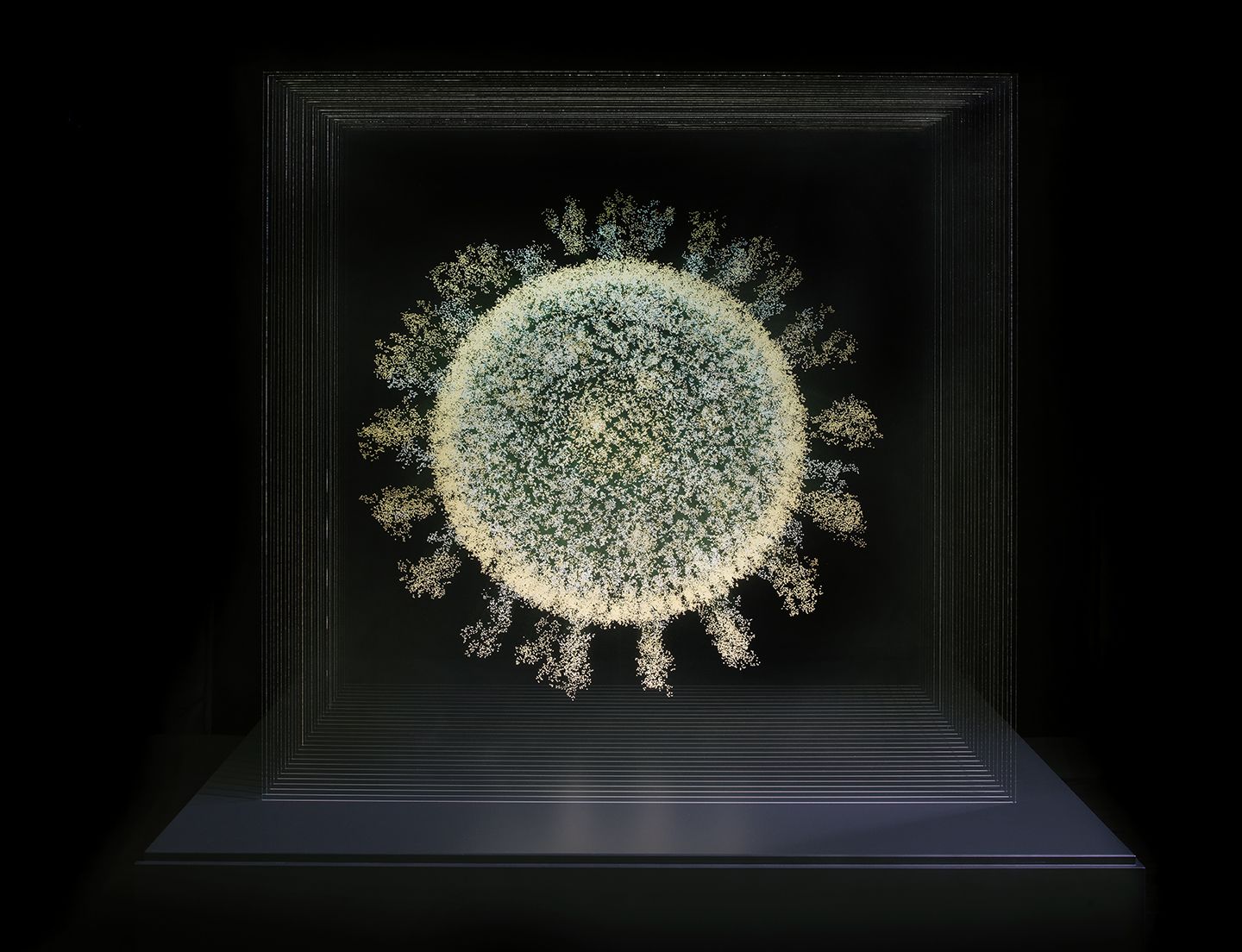 A glowing sphere made from many small points of light