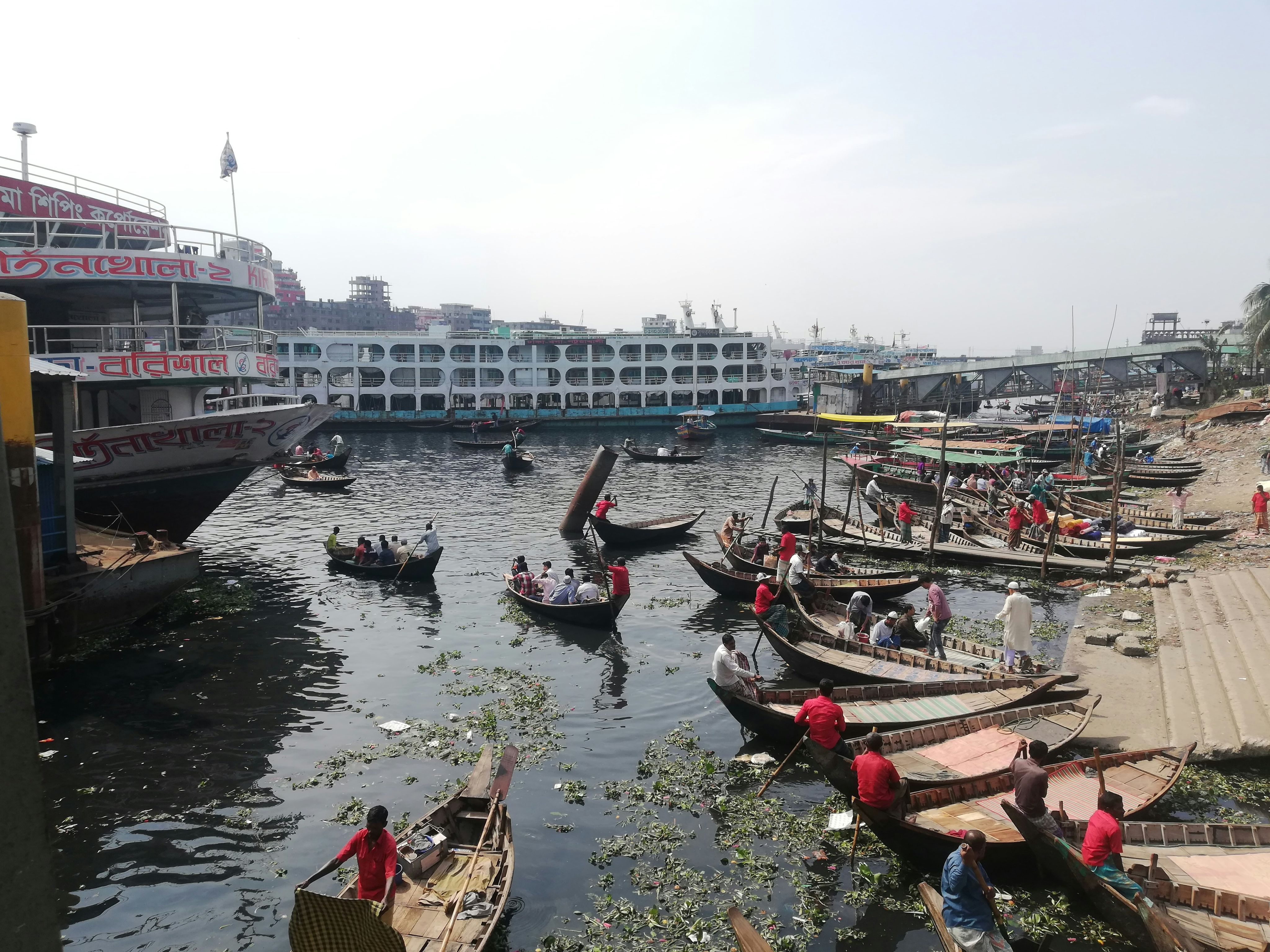 people riding on boat on water during daytime