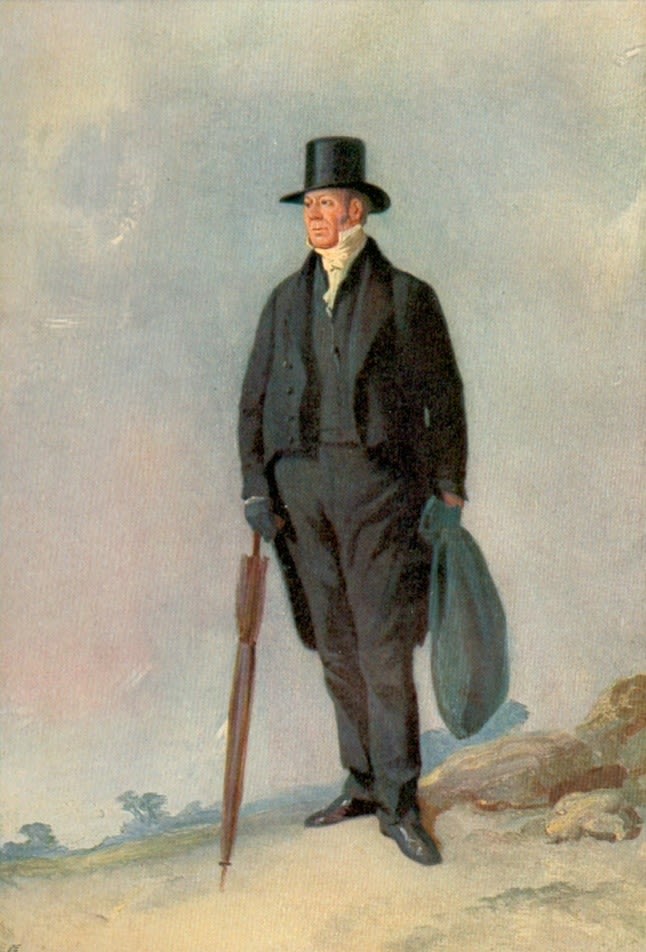 A Victorian man in black suit and jacket, top hat, and leaning against an umbrella