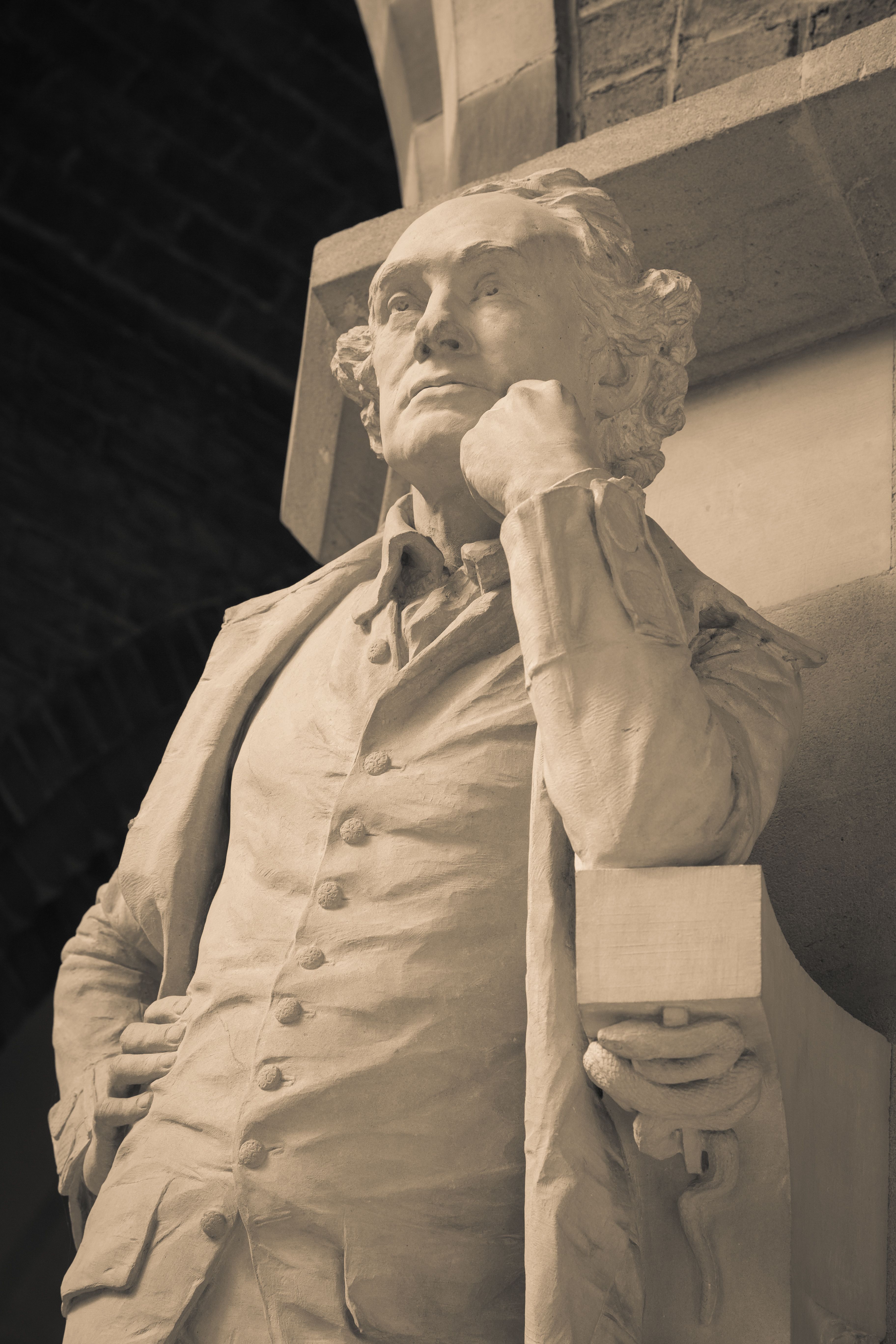 Detail of a statue by Richard Hope Pinker (1850-1927) depicting John Hunter