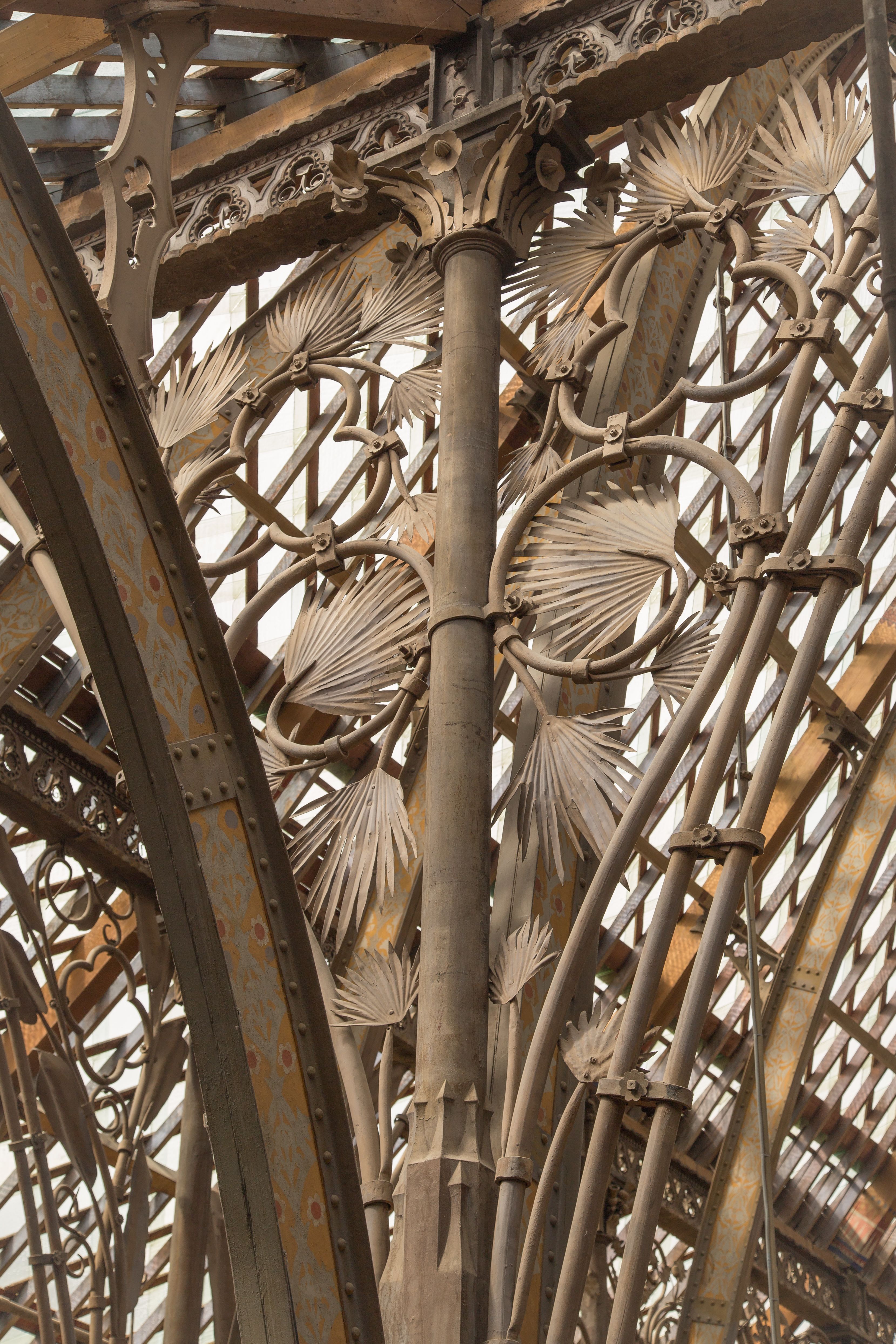 Wrought iron leaves decorating a spandrel on the central court roof