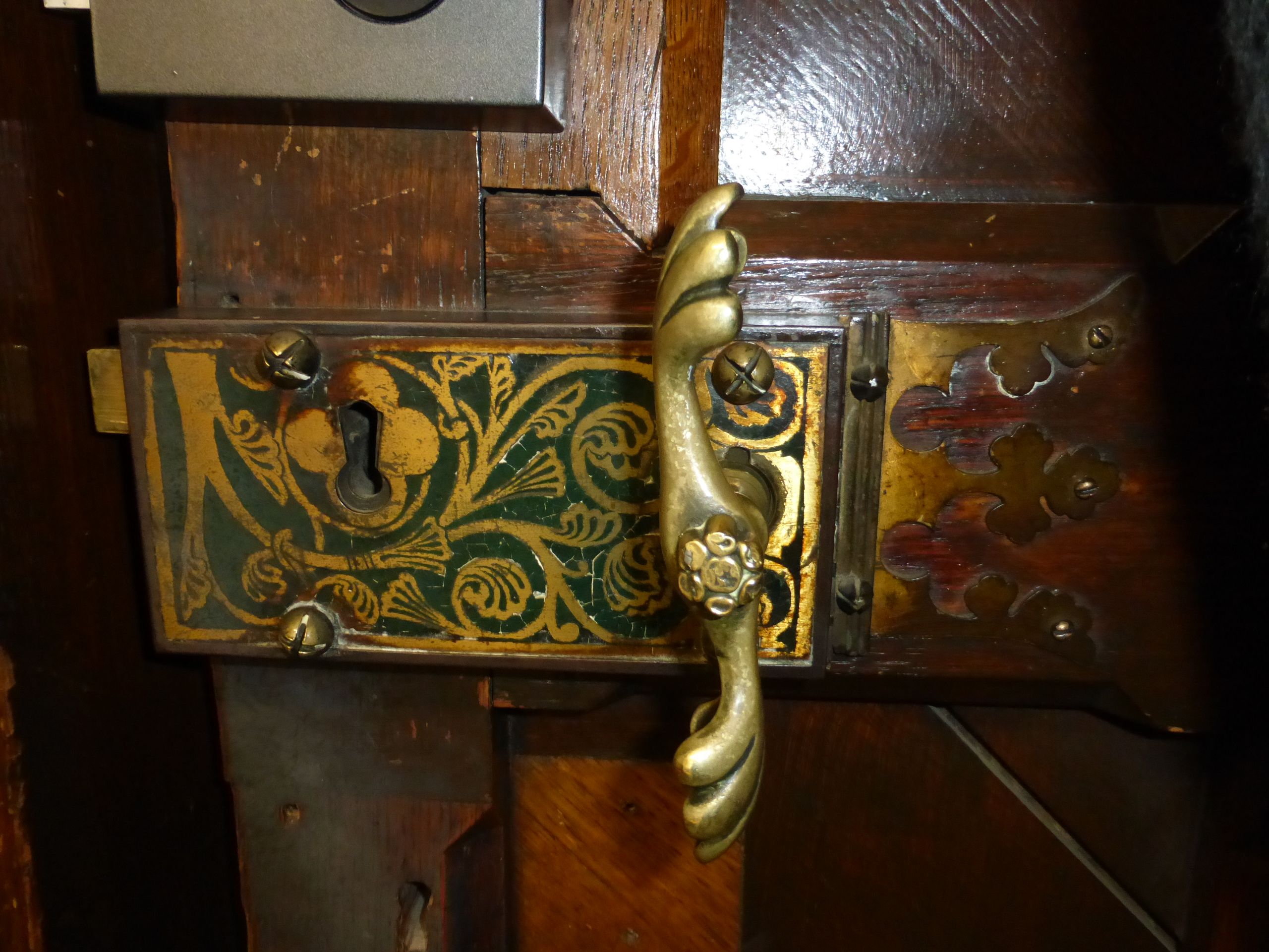 Enamel and brass door lock