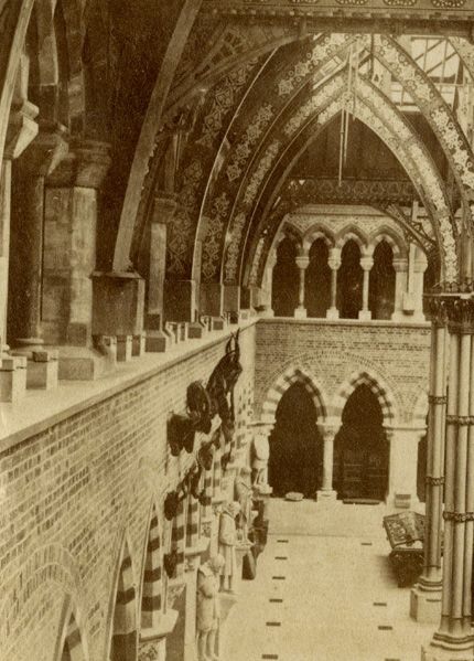 Black and white photo of Museum's central court with uncarved capitals on upper floor