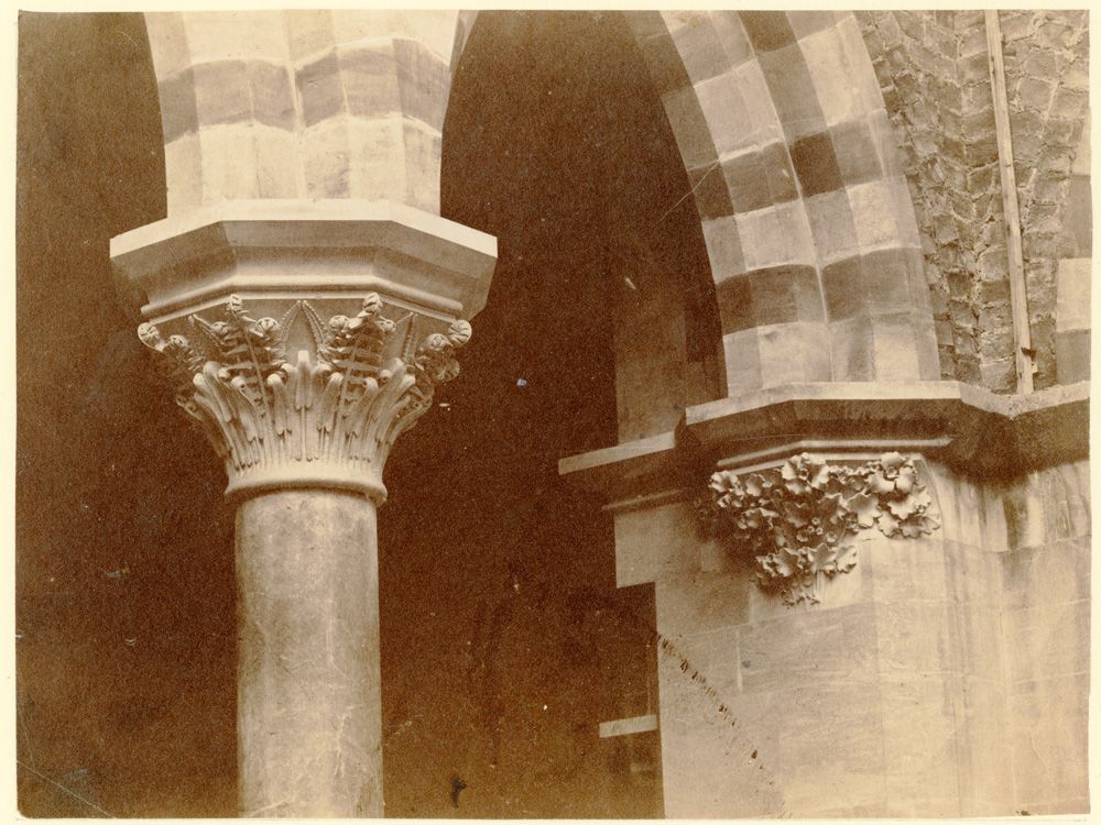 Capital carved with ferns and an adjacent corbel carve with mallow