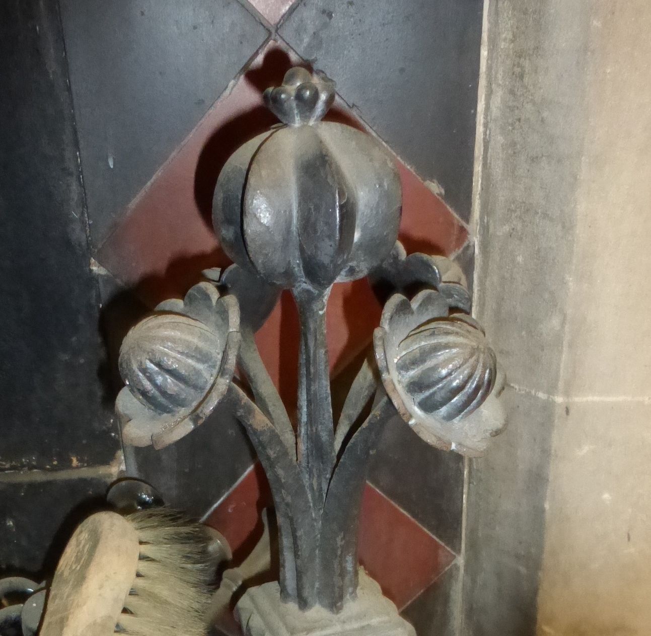 Metal fire irons with poppy head decoration 