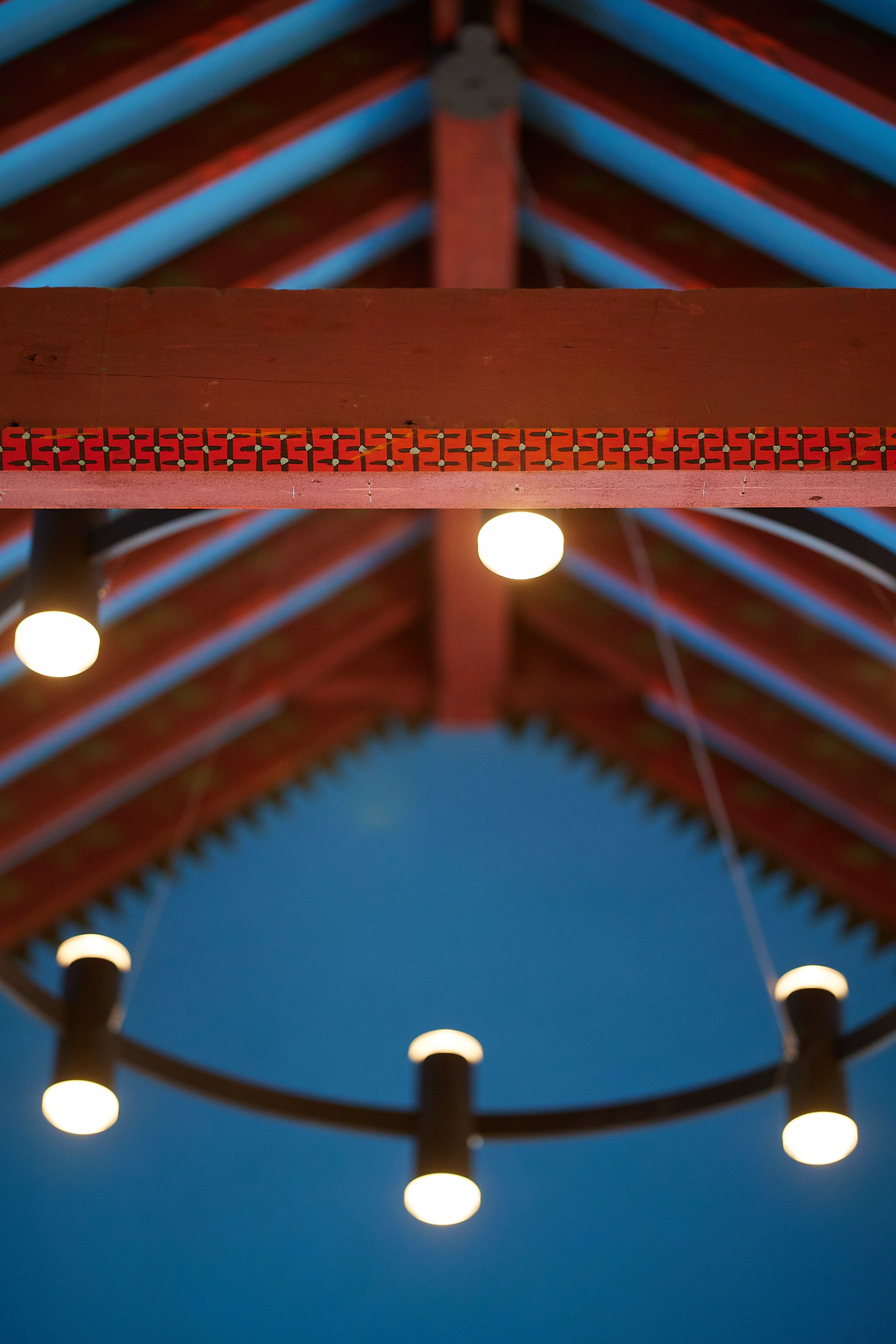 Geometric painted decoration on roof beam